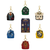 Harry Potter backpack keychains featuring Gryffindor, Slytherin, Ravenclaw and Hufflepuff designs