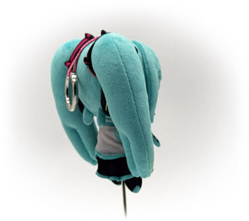 Turquoise elephant plush with a long trunk, pink strap, and metal clip on a white background
