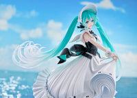 Turquoise-haired anime character in a flowing white dress beside a blue ocean under a cloudy sky