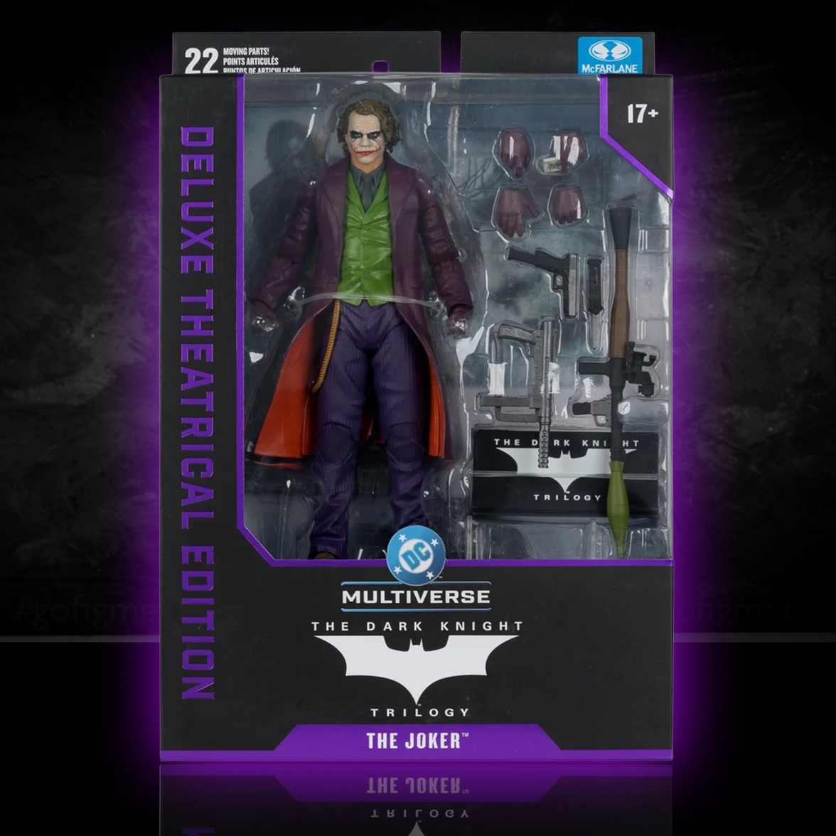 McFarlane Toys DC Multiverse The Dark Knight Joker (Heath Ledger) 7" Action Figure with weapons and accessories in deluxe packaging.