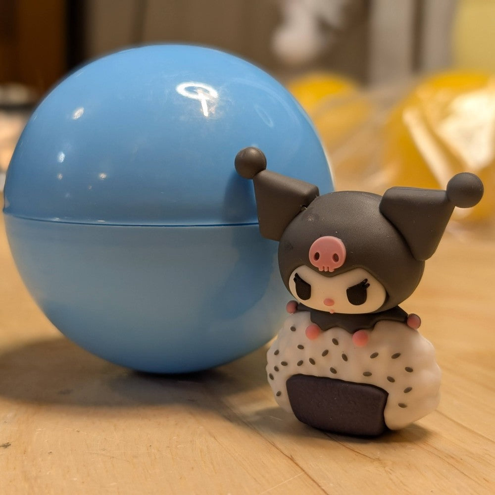 Go Figment Hello Kitty and Friends sushi collectible featuring Kuromi character in dark jester hat on rice ball base