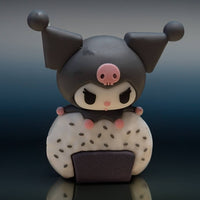 Go Figment Hello Kitty and Friends sushi capsule figure featuring Kuromi character holding a rice ball with sesame seeds