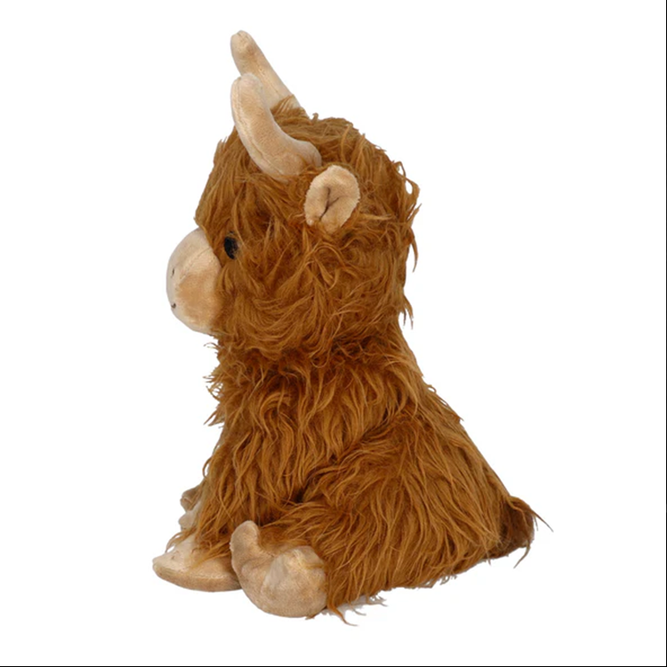 Side view of a microwavable lavender scented Highland cow plush toy for comfort and relaxation.