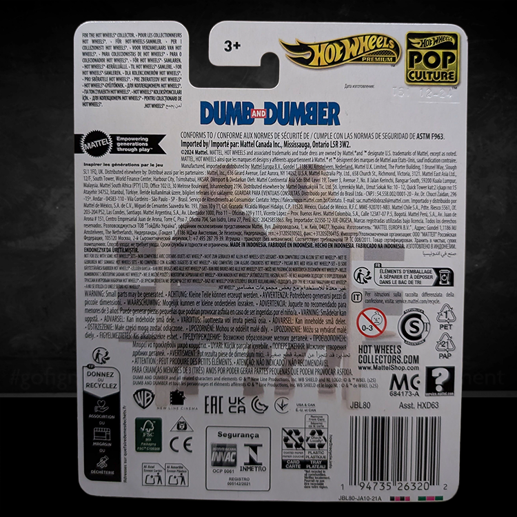 Hot Wheels Premium Dumb and Dumber Mutts Cutts Van packaging showing branding and safety information for ages 3 and up