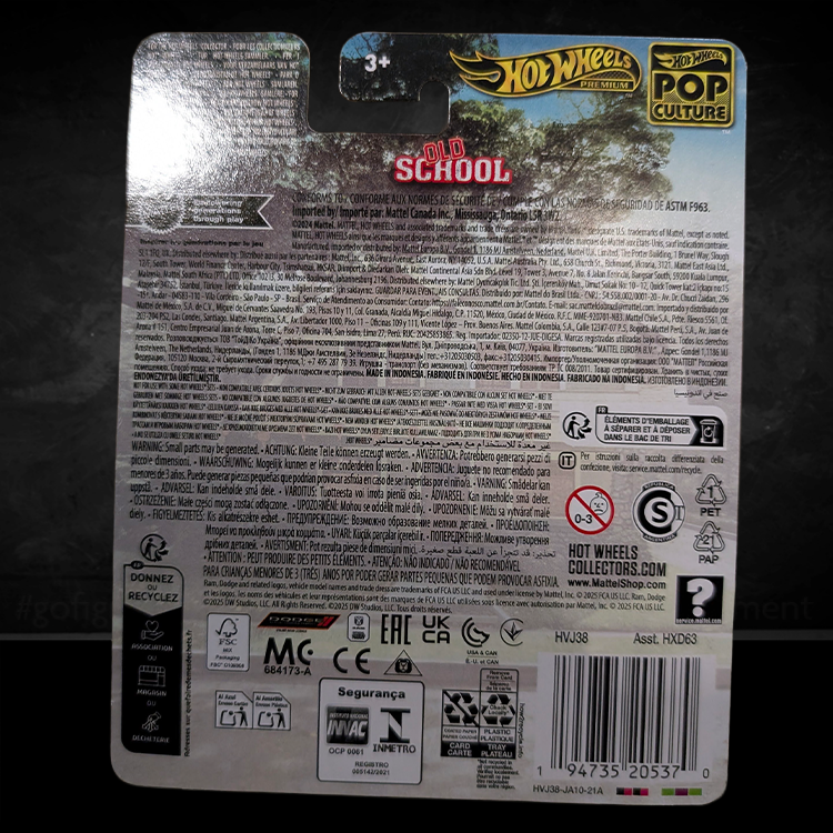 Packaging back of Hot Wheels Premium Old School 1979 Dodge Ram Van diecast car by Mattel with safety and recycling info