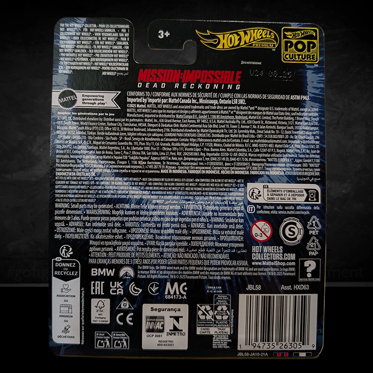 Back packaging of Mattel Hot Wheels Pop Culture Mission Impossible 2025 BMW M5 diecast car with safety and product information.
