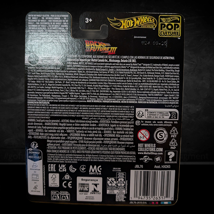 Back to the Future 1955 Time Machine diecast car by Mattel with detailed packaging and collector information.