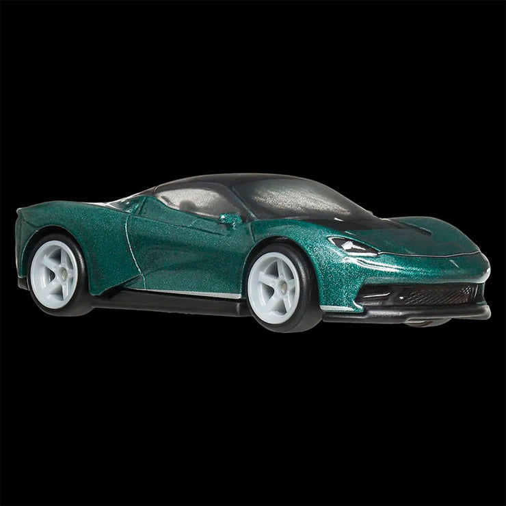 Mattel Hot Wheels green Pininfarina Battista model car with detailed design and white wheels on black background