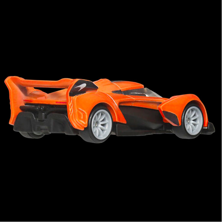 Mattel Hot Wheels McLaren Solus GT die-cast model car in orange with detailed chassis conversion on black background