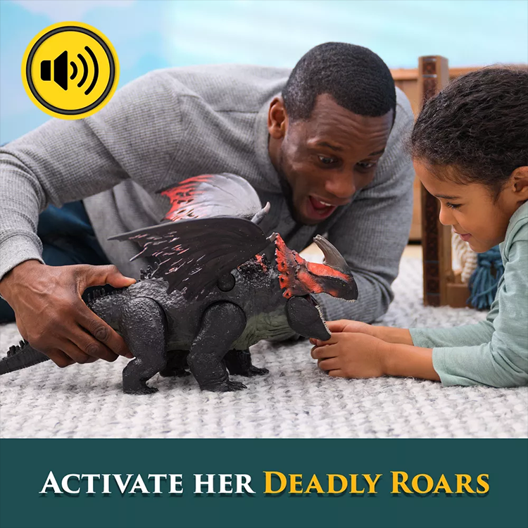 Man and child playing with How to Train Your Dragon Titan Red Death action figure with sound effects on carpet