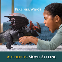 Child playing with Spin Master How to Train Your Dragon Titan Red Death action figure with movable wings and authentic details