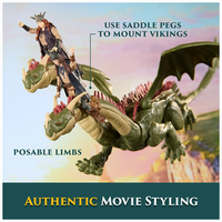 Hideous Zippleback dragon with Ruffnut and Tuffnut figures mounted using saddle pegs, showing posable limbs and wings.