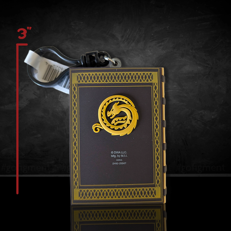 How to Train Your Dragon 3D Book of Dragons PVC foam bag clip showing gold dragon emblem on black cover