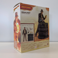 Hasbro Indiana Jones Temple Escape figure with artifact and accessories on detailed Raiders of the Lost Ark box