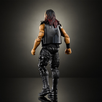 Action figure viewed from behind with dreadlocks wearing a black vest pants and boots