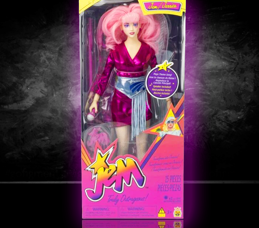 Jem and the Holograms 12 inch fashion doll by Loyal Subjects in pink outfit with microphone and accessories in packaging