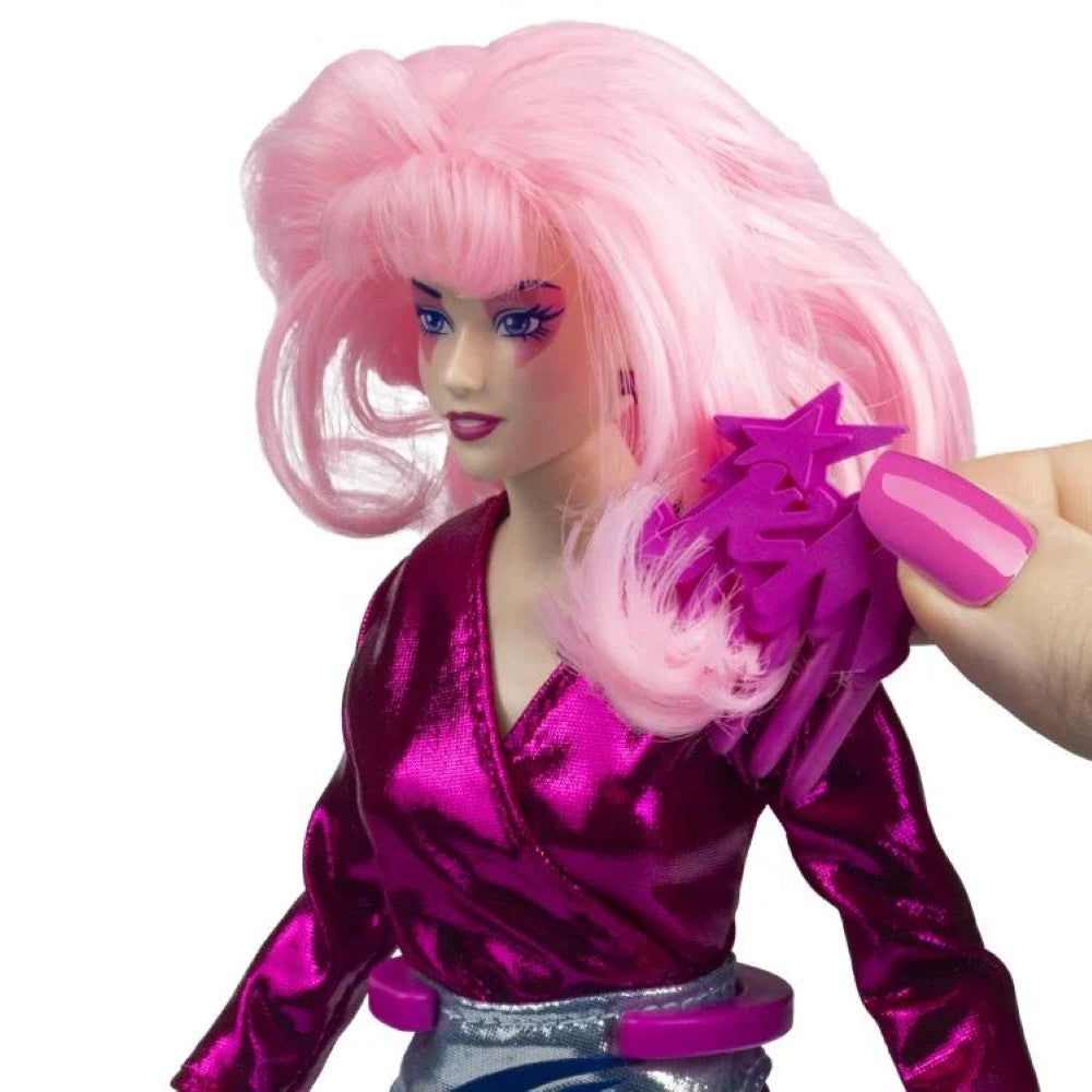 Jem and the Holograms 12 inch fashion doll by Loyal Subjects with pink hair and shiny magenta outfit