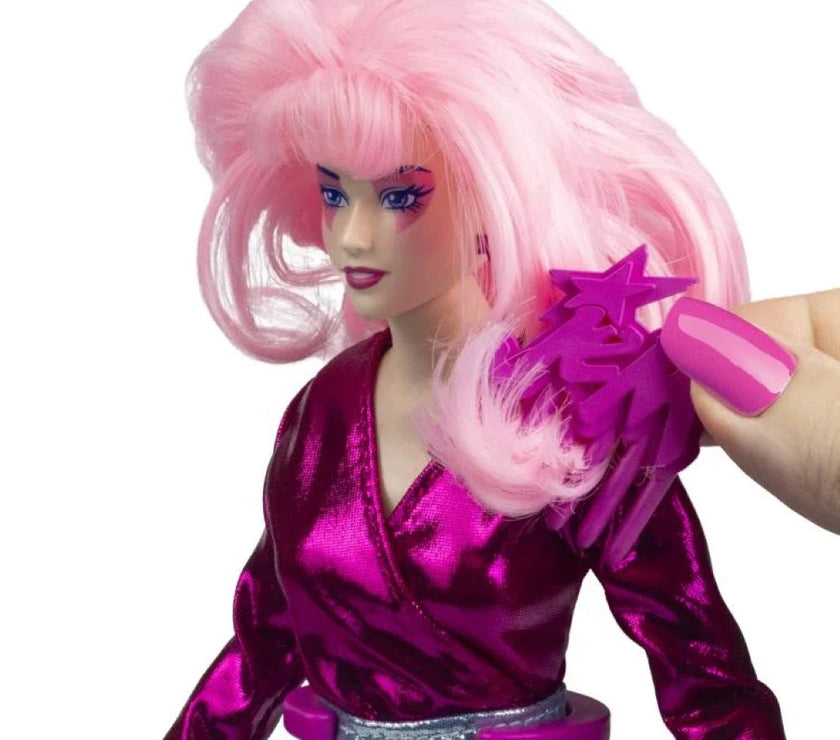 Jem and the Holograms 12 inch fashion doll by Loyal Subjects with pink hair and shiny magenta outfit