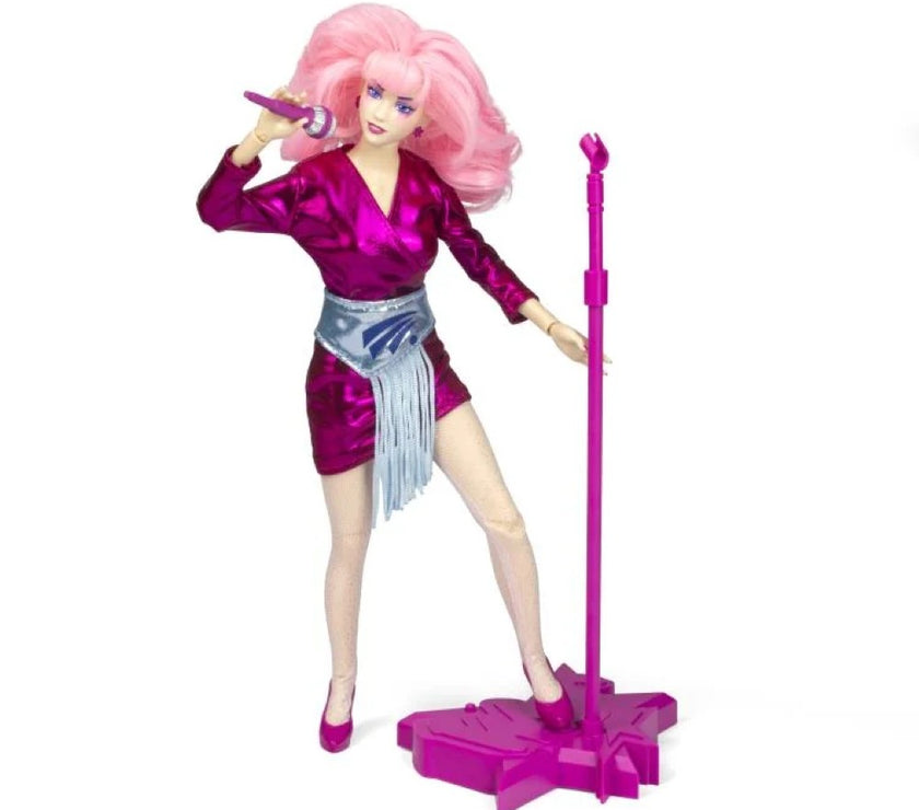 Jem and the Holograms 12 inch fashion doll by Loyal Subjects in shiny pink outfit with pink microphone and stand