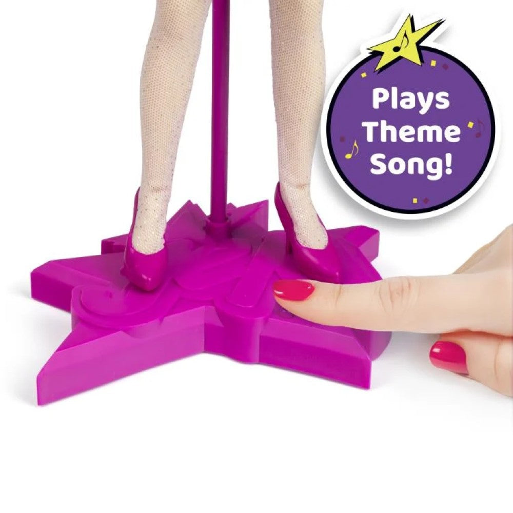 Close-up of Jem doll stand by Loyal Subjects with finger pressing button that plays theme song