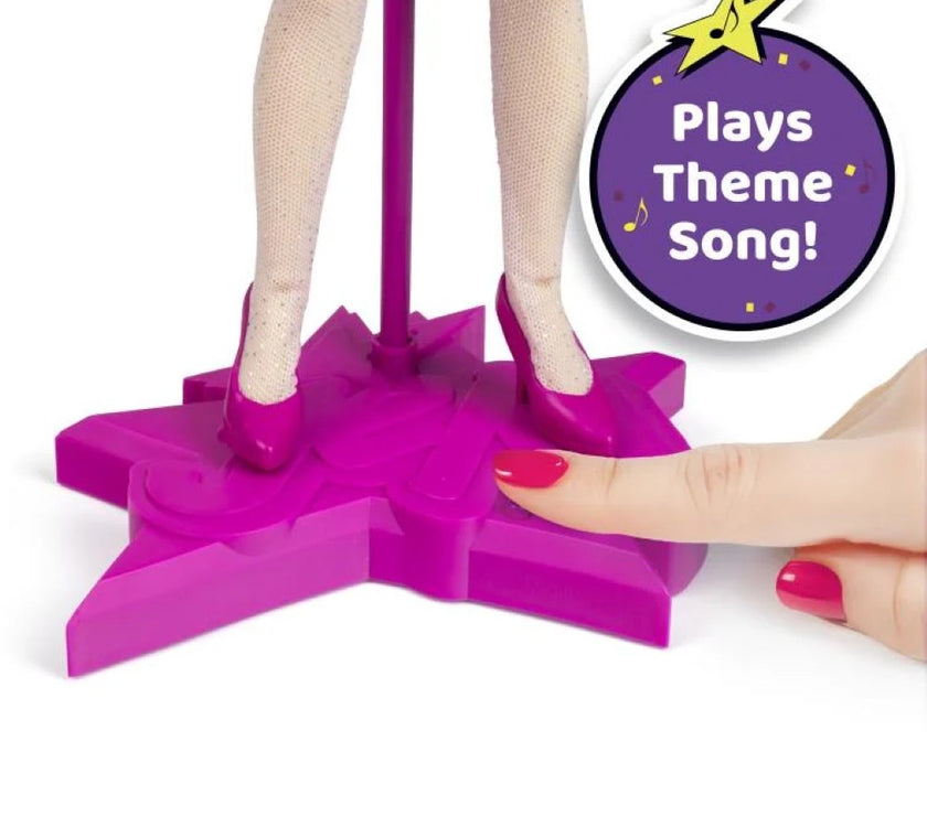 Close-up of Jem doll stand by Loyal Subjects with finger pressing button that plays theme song