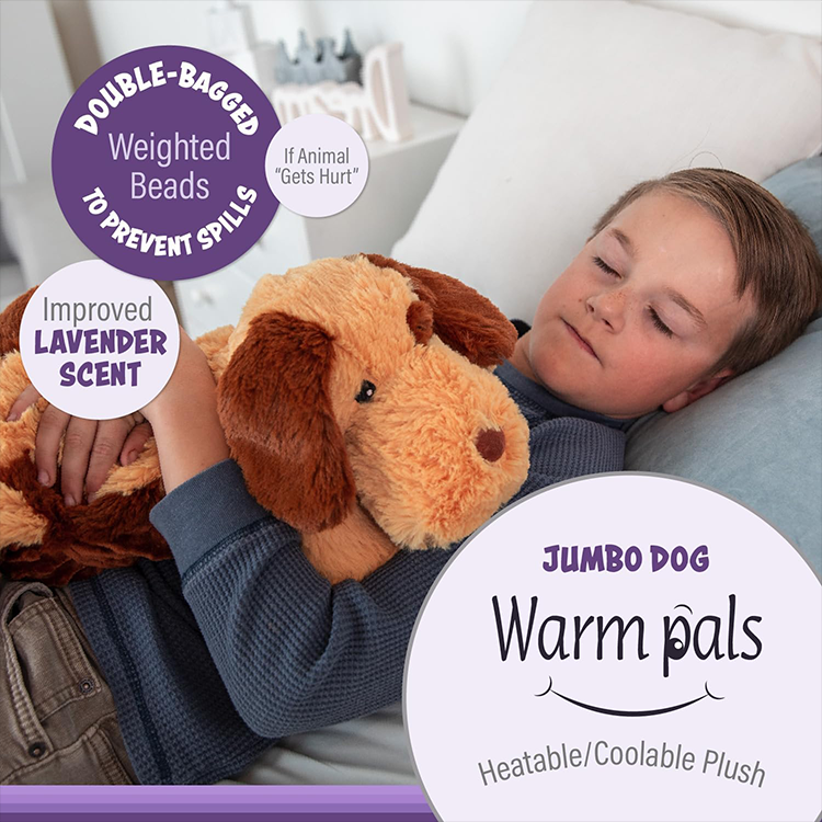 Child resting comfortably with lavender-scented, heatable and coolable weighted plush dog for soothing relief