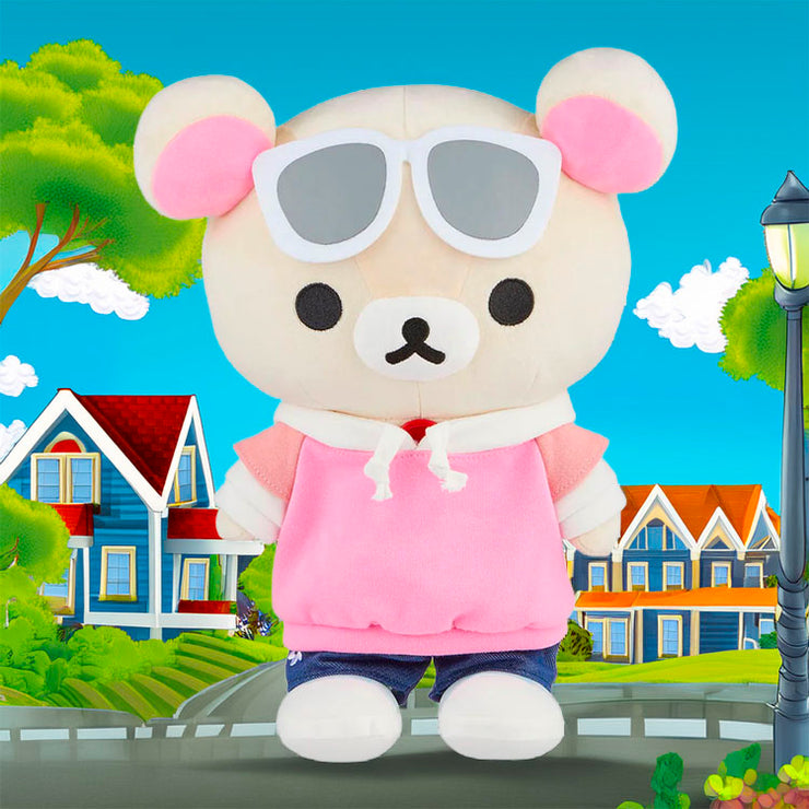 Korilakkuma plush by San-X wearing sunglasses, pink hoodie, and jeans in a bright outdoor neighborhood setting