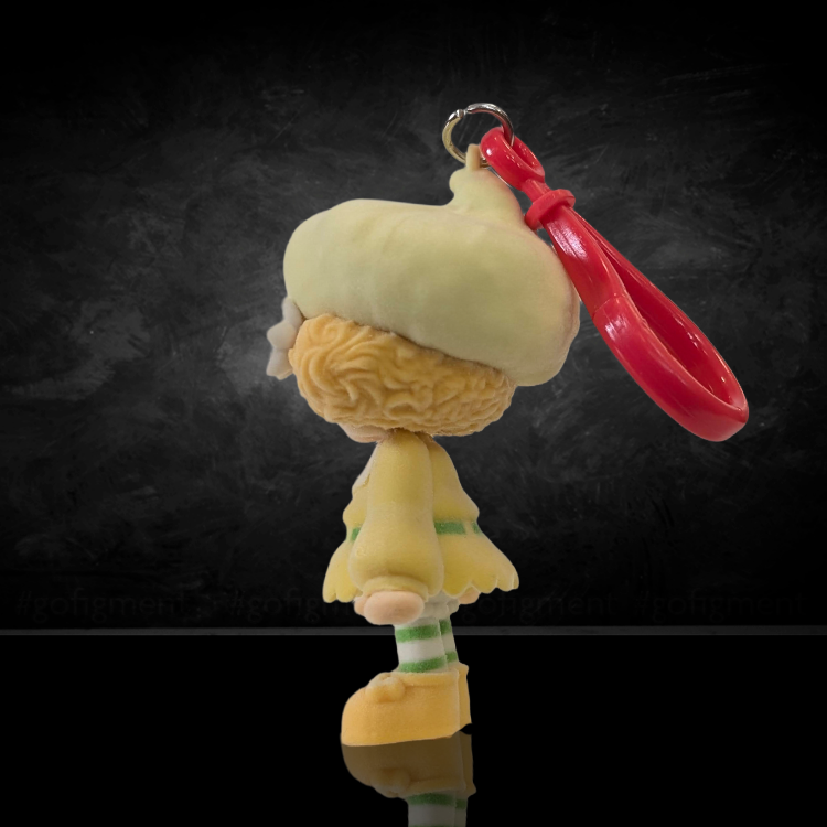 UCC World of Strawberry Shortcake soft flocked mini figure clip with yellow outfit and red plastic hook attachment