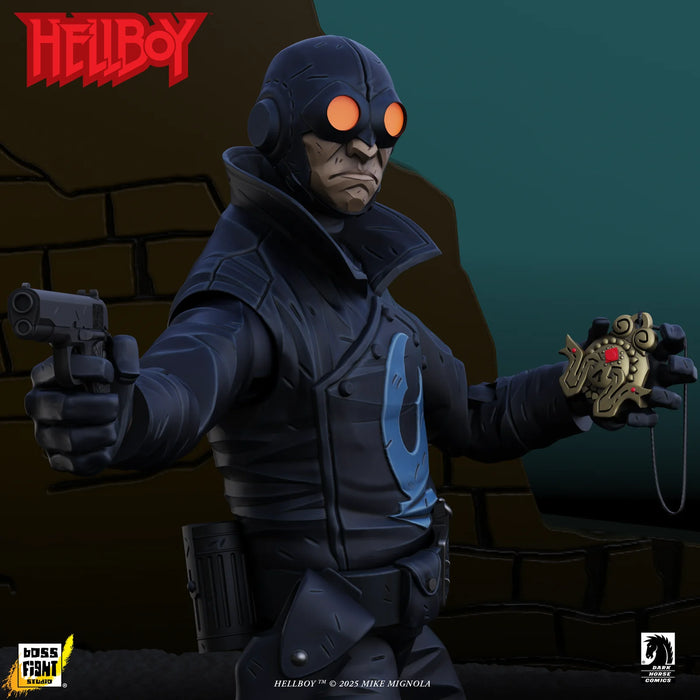 Lobster Johnson 1:12 Scale Action Figure Wave 1 (The Iron Prometheus) by Boss Fight Studio posed with gun and artifact by Go Figment