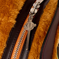 Close-up of Loungefly Shrek Puss In Boots faux fur mini-backpack zipper with sword-shaped pull charm