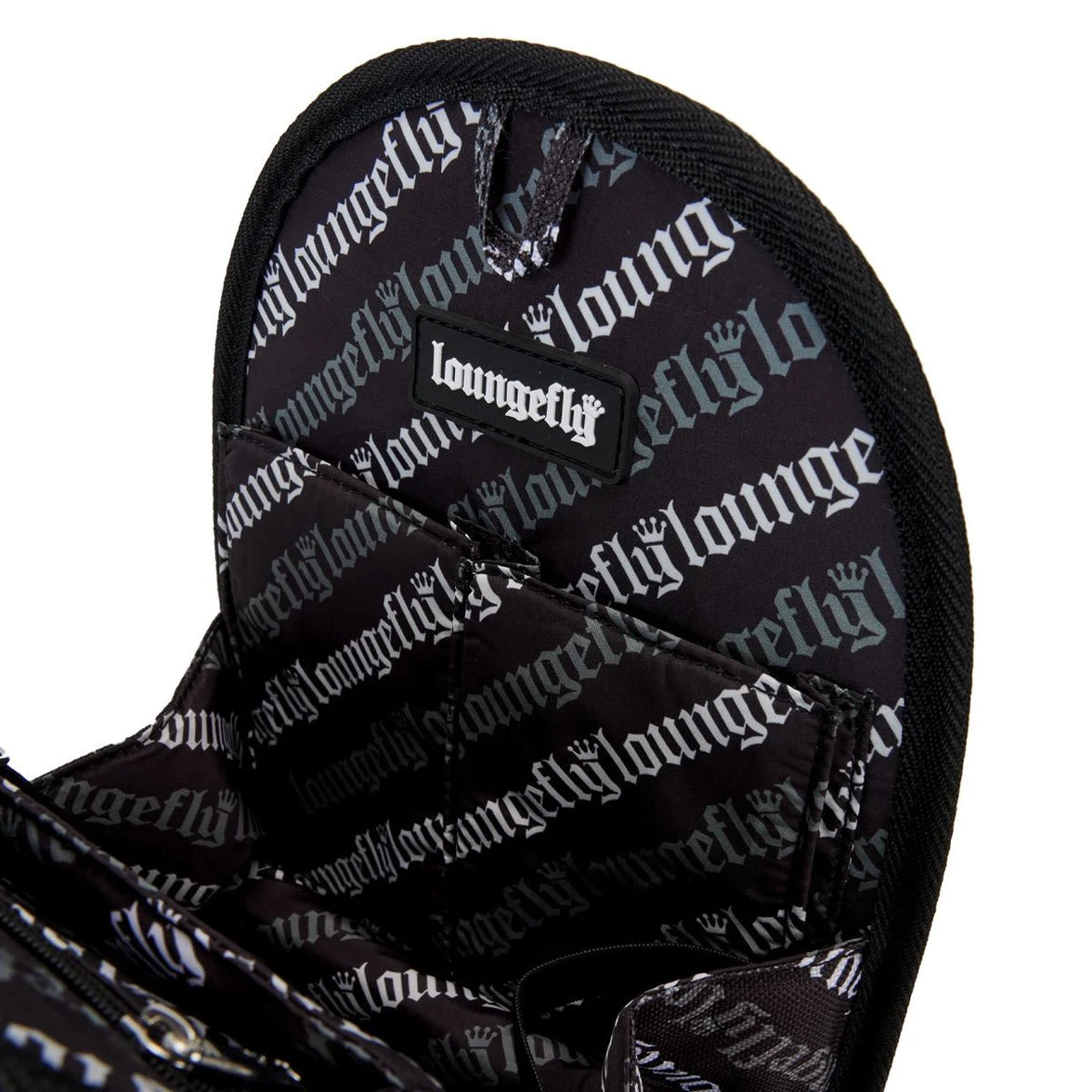Inside view of black Loungefly mini-backpack insert organizer with repeating logo pattern and pockets