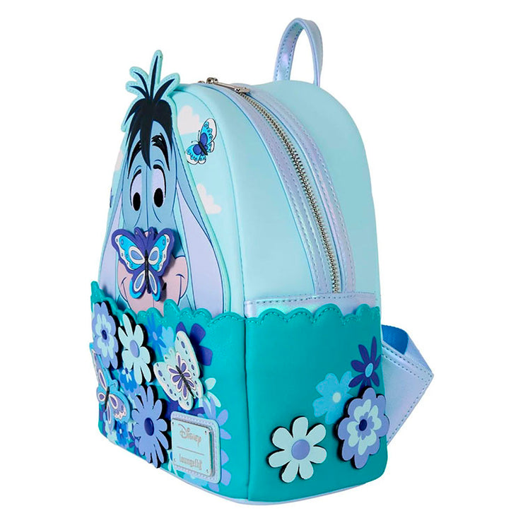 Loungefly mini-backpack featuring Eeyore with butterflies and spinning flower details in blue tones