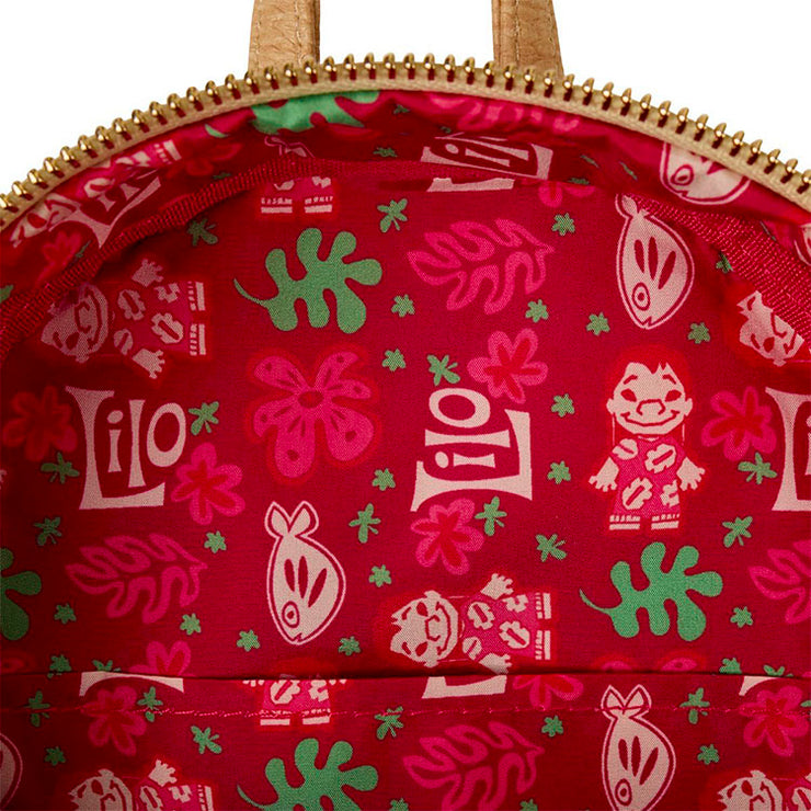 Interior lining of Loungefly Lilo and Stitch mini backpack with red Hawaiian shirt pattern and character prints
