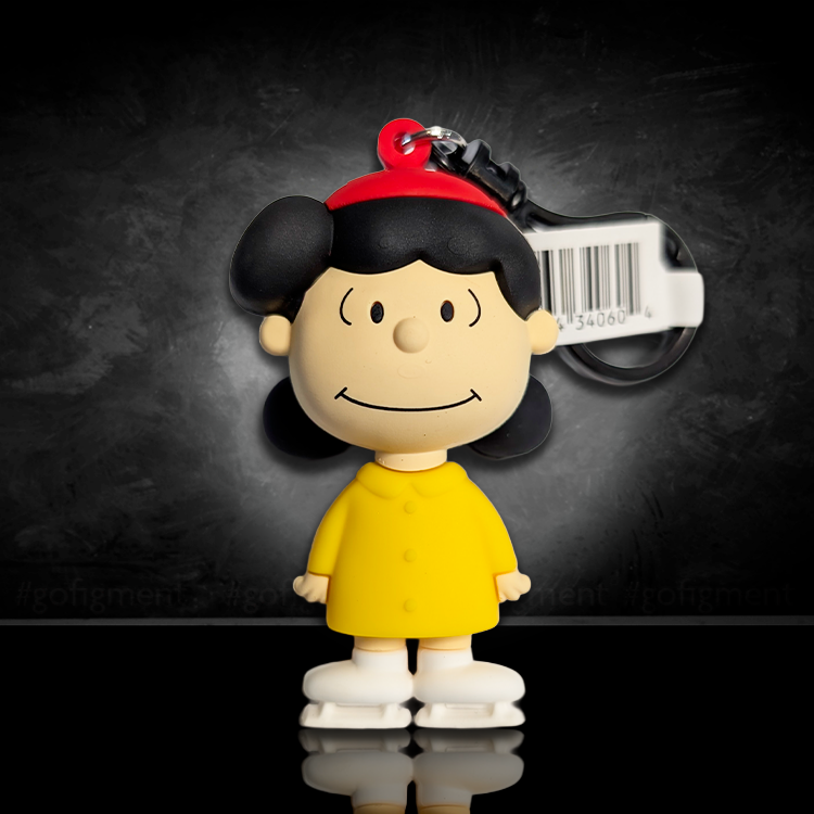 Monogram Peanuts Series 4 Lucy Van Pelt figural bag clip with yellow coat and red hat on black background