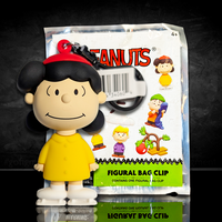 Monogram Peanuts Series 4 Lucy Van Pelt figural bag clip in yellow coat and red hat with packaging