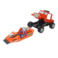 Orange off-road toy vehicle and snowmobile with a seated astronaut figure on a white background