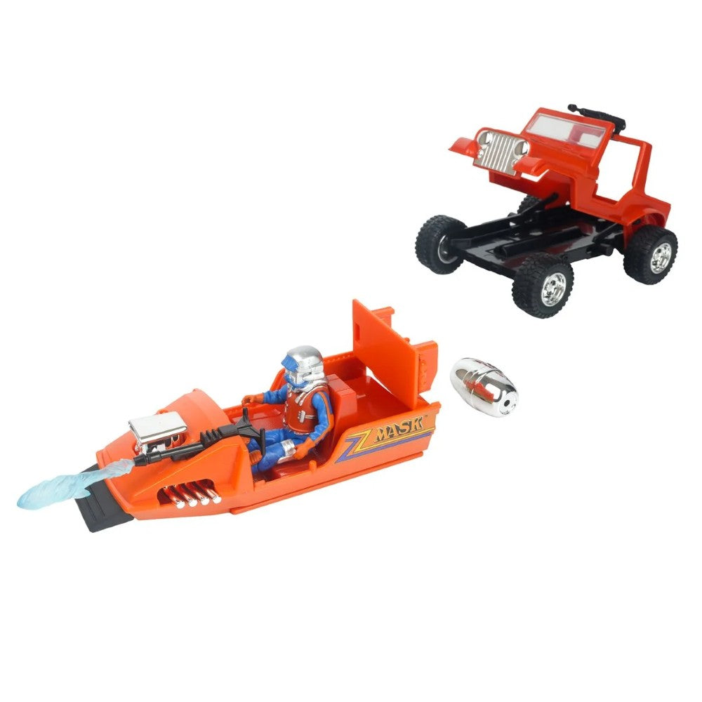 Orange toy vehicle with seated figure beside a red off road buggy and small accessories