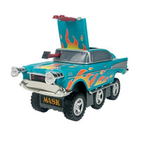 Teal off road vehicle with orange flame decals, oversized tires, and roof mounted equipment