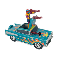 Turquoise vintage style car with flame decals and two colorful action figures standing through the roof