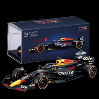 Bburago 1:43 scale Oracle Red Bull Racing Formula 1 diecast car model with black and red design in display case