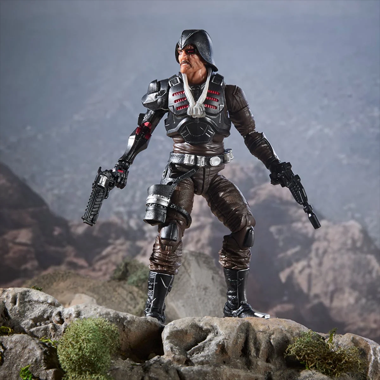 Major Bludd 6-inch action figure from Hasbro in detailed combat pose with weapons on rocky terrain background