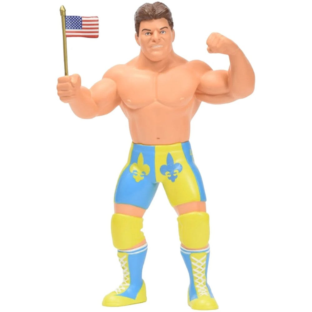 Muscular action figure flexing while holding an American flag, wearing blue and yellow wrestling gear