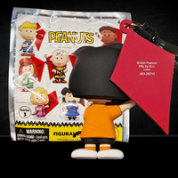 3D foam Marcie bag clip in orange shirt holding red kite from Peanuts 75th Anniversary Series 3 by Monogram
