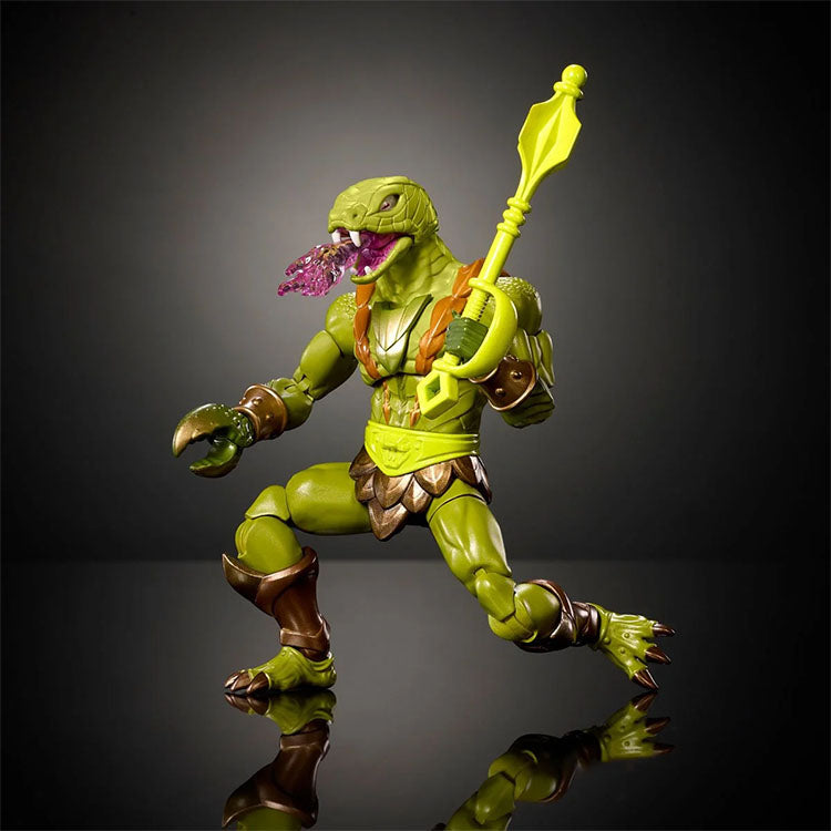 Mattel Masters of the Universe Kobra Khan action figure with hinged jaw and poison blast effect in dynamic pose