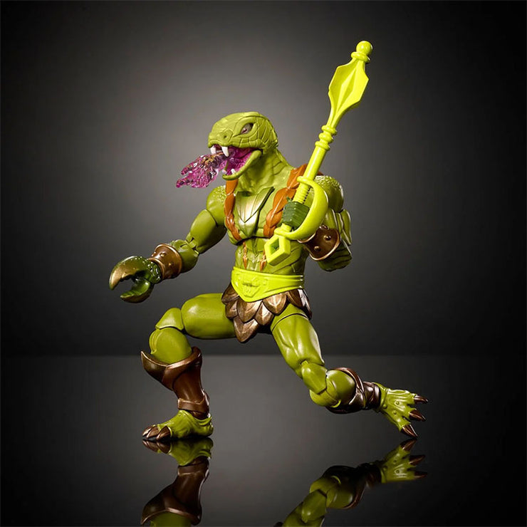 Mattel Masters of the Universe Kobra Khan action figure with hinged jaw and poison blast effect in dynamic pose
