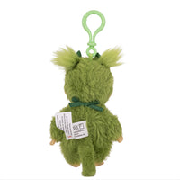 Back view of a green fuzzy plush keychain with a hanging loop tags and tan feet