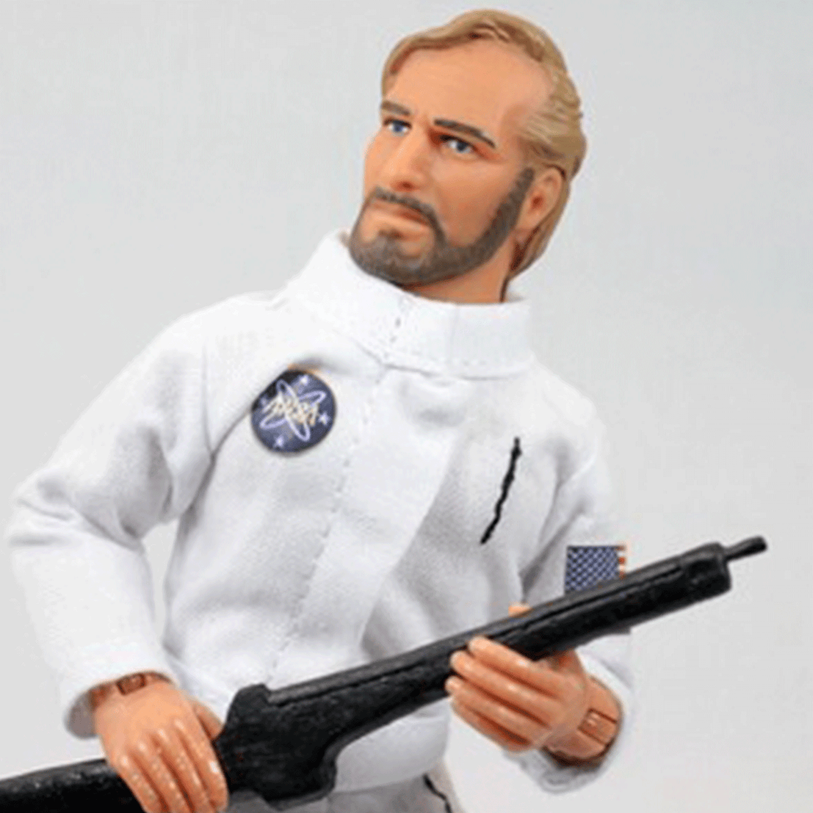 Mego 8-inch retro astronaut figure in white suit holding black rifle with NASA patch and American flag details