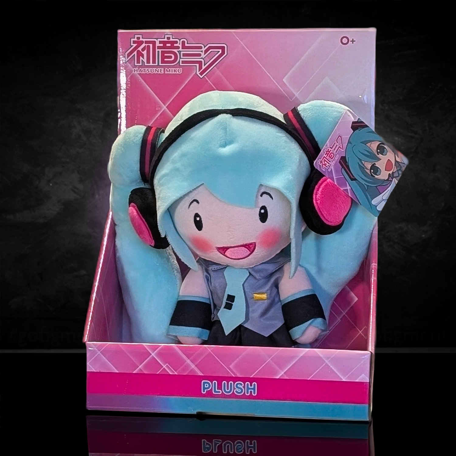 12-inch Hatsune Miku plush toy with blue hair and headset in pink box by UCC official licensed collectible