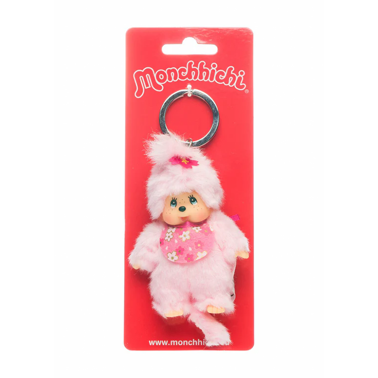 Sekiguchi Monchhichi Cherry Blossom plush keychain with soft pink fur and floral bib on red backing card.