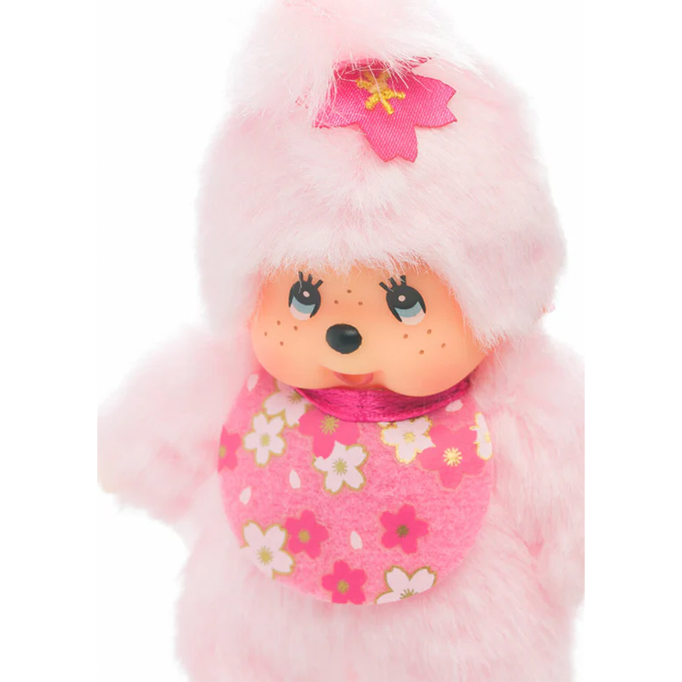 Sekiguchi 4-inch plush keychain featuring a pink cherry blossom-themed Monchhichi character with a soft fuzzy body.